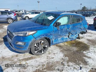 2019 Hyundai Tucson Sport with VIN KM8J33ALXKU857925, listed as a IAAI auction lot 41369786 with 41,365 mi miles. Bid and sale history available at carsss.com. Image 17.