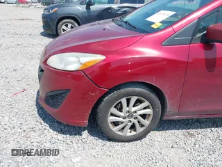 2013 Mazda 5 Sport z VIN JM1CW2BL9D0156297, wystawiony jako IAAI lot #42472475 z przebiegiem 249 858 mil mil oraz . Historia ofert i sprzedaży dostępna na DreamBid. Obrazek 6.