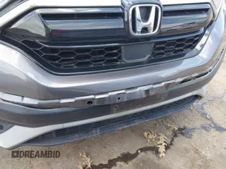 2020 Honda CR-V EX with VIN 2HKRW1H58LH407583, listed as a IAAI auction lot 42446451 with 48,476 mi miles and . Bid and sale history available at DreamBid. Image 6.