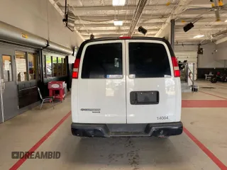 2014 Chevrolet Express Cargo with VIN 1GCWGFCA2E1184095, listed as a IAAI auction lot 42725036 with 270,636 mi miles and . Bid and sale history available at DreamBid. Image 33.