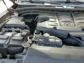 2017 Infiniti QX80 z VIN JN8AZ2NF8H9643257, wystawiony jako Copart lot #61330975 z przebiegiem 126 224 mil mil oraz Szkoda całkowita • Salvage title. Historia ofert i sprzedaży dostępna na DreamBid. Obrazek 14.