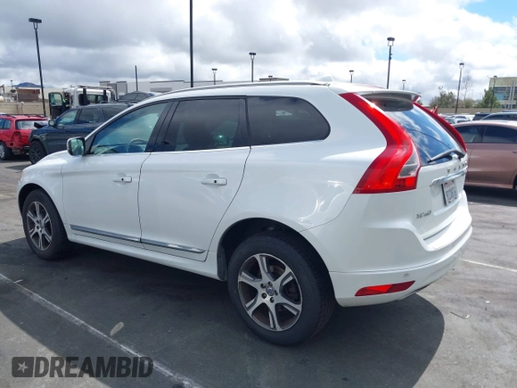 2014 Volvo XC60 R-Design Premier Plus z VIN YV4902DZ5E2554526, wystawiony jako IAAI lot #41764512 z przebiegiem 129 230 mil mil oraz . Historia ofert i sprzedaży dostępna na DreamBid. Obrazek 14.