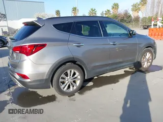 2017 Hyundai Santa Fe Sport 2.0T with VIN 5XYZU4LA7HG406516, listed as a IAAI auction lot 41847977 with 105,299 mi miles. Bid and sale history available at carsss.com. Image 4.