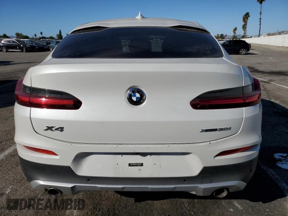 2020 BMW X4 xDrive30i with VIN 5UX2V1C09L9B97540, listed as a Copart auction lot 73984983 with 64,343 mi miles. Bid and sale history available at carsss.com. Image 6.