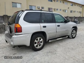 2005 GMC Envoy SLT with VIN 1GKDS13S352101385, listed as a Copart auction lot 89271025 with 165,670 mi miles and Salvage Title. Bid and sale history available at carsss.com. Image 3.