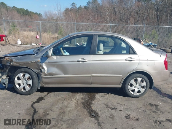 2004 Kia Spectra LX with VIN KNAFE121745039519, listed as a IAAI auction lot 41482402 with 201,123 mi miles. Bid and sale history available at carsss.com. Image 15.
