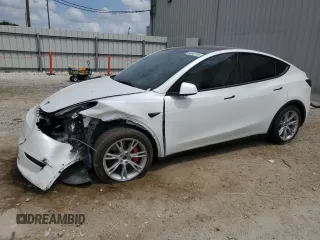 2021 Tesla Model Y Long Range with VIN 5YJYGDEE5MF203130, listed as a Copart auction lot 54642795 with 73,663 mi miles and Non Repairable. Bid and sale history available at DreamBid. Image 1.