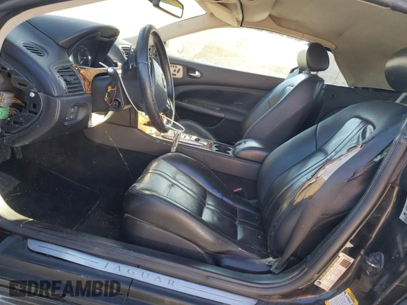 2007 Jaguar XK with VIN SAJDA44B975B00696, listed as a Copart auction lot 83102494 with Not Provided miles and Clean Title. Bid and sale history available at carsss.com. Image 7.