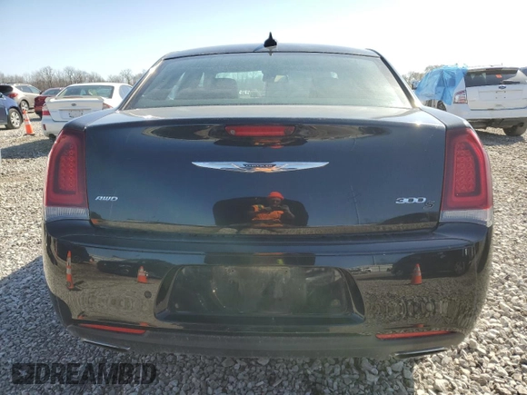 2016 Chrysler 300 S with VIN 2C3CCAGG8GH304863, listed as a Copart auction lot 49306765 with 118,452 mi miles and Salvage Title. Bid and sale history available at DreamBid. Image 6.