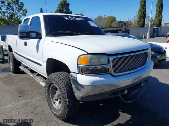 2000 GMC Sierra 1500 SLT with VIN 1GTEC19T7YZ241853, listed as a IAAI auction lot 41657692 with 166,517 mi miles. Bid and sale history available at carsss.com. Image 1.