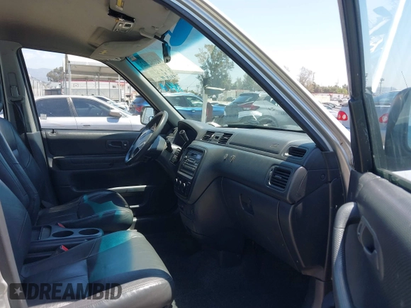 1999 Honda CR-V LX with VIN JHLRD2847XC000944, listed as a IAAI auction lot 42082593 with 198,474 mi miles. Bid and sale history available at carsss.com. Image 5.