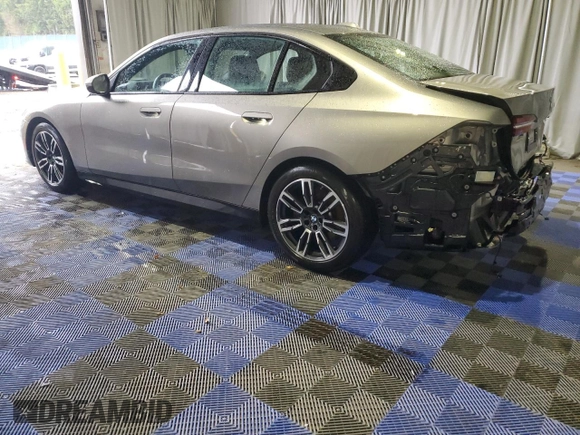 2024 BMW 5 Series 530i with VIN WBA43FJ0XRCS74003, listed as a Copart auction lot 43703145 with 7,942 mi miles and Clean Title. Bid and sale history available at carsss.com. Image 2.