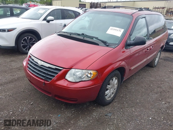 2005 Chrysler Town & Country Touring z VIN 2C4GP54L15R400903, wystawiony jako IAAI lot #42292131 z przebiegiem 149 371 mil mil oraz . Historia ofert i sprzedaży dostępna na DreamBid. Obrazek 2.