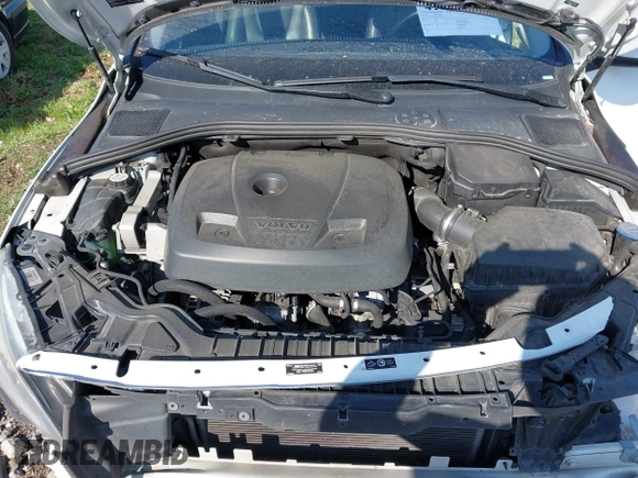 2015 Volvo V60 T5 Drive-E Premier z VIN YV140MEK2F1267396, wystawiony jako IAAI lot #41921329 z przebiegiem 93 937 mil mil oraz . Historia ofert i sprzedaży dostępna na DreamBid. Obrazek 10.