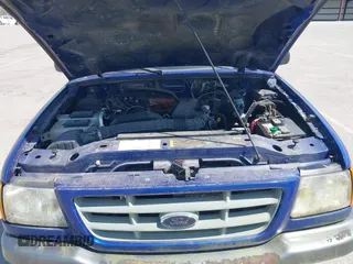 2003 Ford Ranger XL with VIN 1FTYR14U03PB77803, listed as a IAAI auction lot 42058094 with 216,170 mi miles. Bid and sale history available at carsss.com. Image 10.