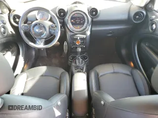 2015 MINI Countryman S with VIN WMWZC5C53FWP44388, listed as a Copart auction lot 54560585 with 67,913 mi miles and Salvage Title. Bid and sale history available at DreamBid. Image 8.