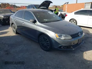 2012 Volkswagen Jetta SEL z VIN 3VWLP7AJ2CM418230, wystawiony jako IAAI lot #41792896 z przebiegiem 220 036 mil mil oraz . Historia ofert i sprzedaży dostępna na DreamBid. Obrazek 1.