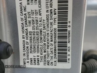 2013 Honda CR-V EX-L z VIN 2HKRM4H78DH668500, wystawiony jako Copart lot #56312175 z przebiegiem 189 320 mil mil oraz Szkody całkowita. Historia ofert i sprzedaży dostępna na DreamBid. Obrazek 13.