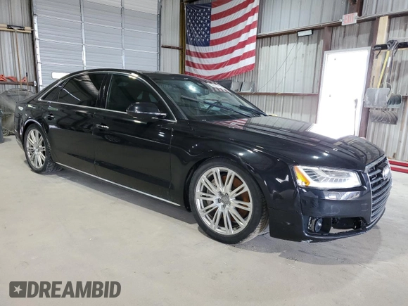 2015 Audi A8 3.0T z VIN WAU3GAFD2FN040940, wystawiony jako Copart lot #65327685 z przebiegiem 113 443 mil mil oraz Czysty tytuł • Clean title. Historia ofert i sprzedaży dostępna na DreamBid. Obrazek 4.