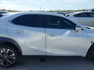 2021 Lexus UX with VIN JTHX3JBH5M2034944, listed as a IAAI auction lot 41068335 with 53,522 mi miles. Bid and sale history available at carsss.com. Image 13.