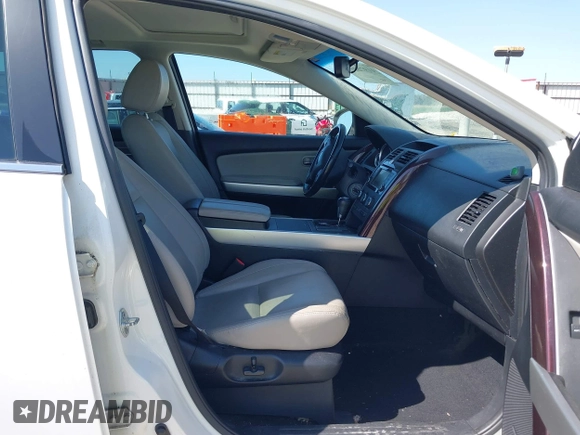 2013 Mazda CX-9 Grand Touring with VIN JM3TB2DA3D0403697, listed as a IAAI auction lot 41976262 with 127,117 mi miles and . Bid and sale history available at DreamBid. Image 5.