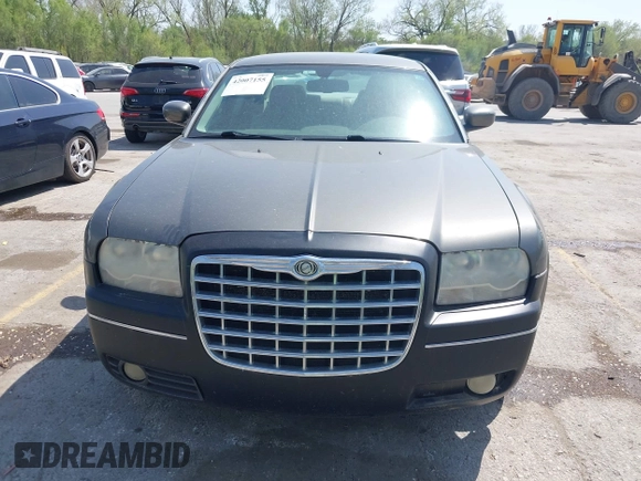 2008 Chrysler 300 Touring with VIN 2C3LA53G48H295678, listed as a IAAI auction lot 42007155 with 218,020 mi miles. Bid and sale history available at carsss.com. Image 6.