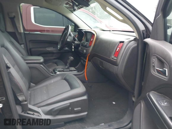 2017 GMC Canyon 4WD SLE z VIN 1GTG6CEN9H1140962, wystawiony jako IAAI lot #42251320 z przebiegiem 142 099 mil mil oraz . Historia ofert i sprzedaży dostępna na DreamBid. Obrazek 5.