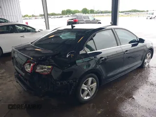 2012 Volkswagen Jetta TDI w/Premium & Nav with VIN 3VWLL7AJ8CM326549, listed as a IAAI auction lot 42748170 with 200,385 mi miles and . Bid and sale history available at DreamBid. Image 4.