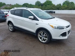 2013 Ford Escape Titanium z VIN 1FMCU9J95DUB94585, wystawiony jako IAAI lot #42427126 z przebiegiem 211 309 mil mil oraz . Historia ofert i sprzedaży dostępna na DreamBid. Obrazek 1.