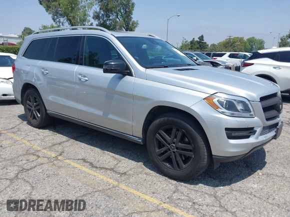 2014 Mercedes-Benz GL 450 z VIN 4JGDF7CE9EA411572, wystawiony jako IAAI lot #42461631 z przebiegiem 121 885 mil mil oraz . Historia ofert i sprzedaży dostępna na DreamBid. Obrazek 1.