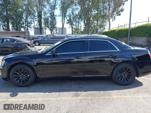 2014 Chrysler 300 with VIN 2C3CCAAG9EH264914, listed as a IAAI auction lot 42003052 with 103,789 mi miles. Bid and sale history available at carsss.com. Image 14.