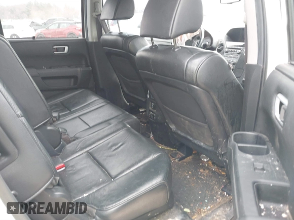 2013 Honda Pilot Touring with VIN 5FNYF3H98DB025516, listed as a IAAI auction lot 41767097 with 202,908 mi miles and . Bid and sale history available at DreamBid. Image 8.