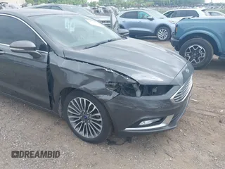 2017 Ford Fusion SE with VIN 3FA6P0T9XHR186017, listed as a IAAI auction lot 42535725 with 166,794 mi miles and . Bid and sale history available at DreamBid. Image 6.