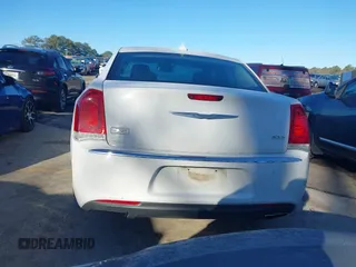 2016 Chrysler 300 Anniversary Edition with VIN 2C3CCAAG6GH343881, listed as a IAAI auction lot 41593752 with 135,719 mi miles and . Bid and sale history available at DreamBid. Image 16.