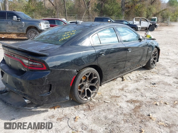 2019 Dodge Charger R/T with VIN 2C3CDXCT0KH742840, listed as a IAAI auction lot 41132315 with 62,136 mi miles and . Bid and sale history available at carsss.com. Image 4.