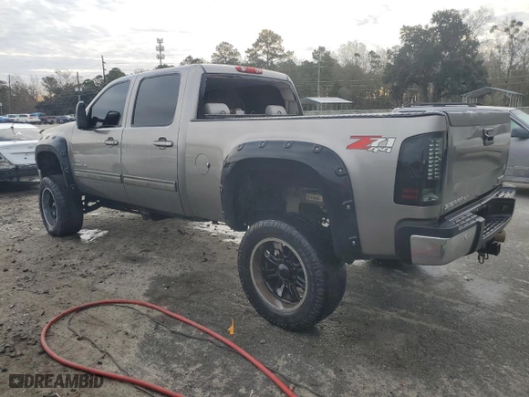 2009 GMC Sierra 2500HD SLT with VIN 1GTHK63679F154246, listed as a Copart auction lot 76985313 with 0 mi miles and Salvage Title. Bid and sale history available at carsss.com. Image 2.