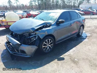 2015 Volkswagen Jetta Sedan 2.0L S with VIN 3VW2K7AJ7FM244556, listed as a IAAI auction lot 41776216 with 116,864 mi miles. Bid and sale history available at carsss.com. Image 2.