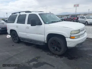 2003 Chevrolet Tahoe Z71 with VIN 1GNEK13Z03R240494, listed as a IAAI auction lot 42075566 with 203,398 mi miles. Bid and sale history available at carsss.com. Image 1.
