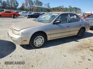 1996 Nissan Altima XE with VIN 1N4BU31D5TC104895, listed as a Copart auction lot 77043684 with 133,113 mi miles and Salvage Title. Bid and sale history available at DreamBid. Image 1.