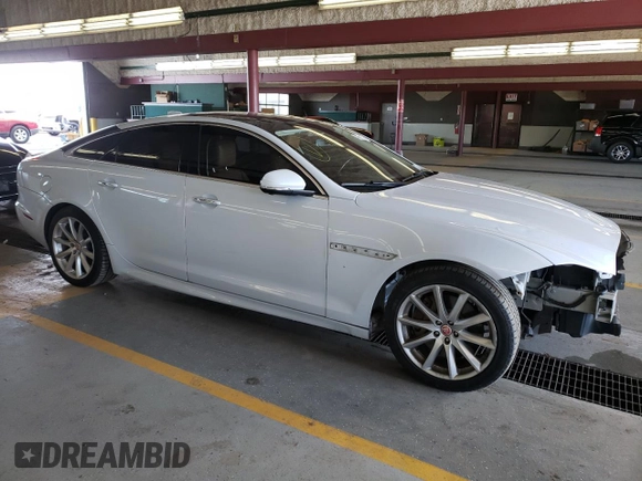 2016 Jaguar XJ R-Sport with VIN SAJWJ1CD1G8V92615, listed as a Copart auction lot 79531373 with 108,166 mi miles and . Bid and sale history available at DreamBid. Image 4.