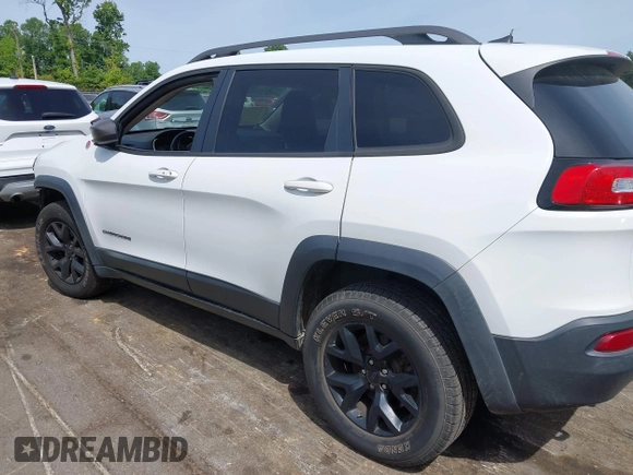 2016 Jeep Cherokee Trailhawk z VIN 1C4PJMBS7GW109189, wystawiony jako IAAI lot #42219470 z przebiegiem 115 197 mil mil oraz . Historia ofert i sprzedaży dostępna na DreamBid. Obrazek 3.
