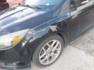 2015 Ford Focus SE with VIN 1FADP3K2XFL319559, listed as a IAAI auction lot 42205107 with 184,499 mi miles. Bid and sale history available at carsss.com. Image 13.