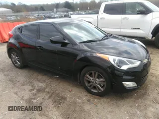 2013 Hyundai Veloster w/Black Int with VIN KMHTC6AD5DU097618, listed as a IAAI auction lot 41876394 with 159,519 mi miles. Bid and sale history available at carsss.com. Image 1.