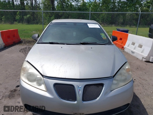 2006 Pontiac G6 GT with VIN 1G2ZH358364273262, listed as a IAAI auction lot 41963147 with 128,440 mi miles and . Bid and sale history available at DreamBid. Image 6.