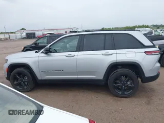 2023 Jeep Grand Cherokee Altitude with VIN 1C4RJHAG8PC611840, listed as a IAAI auction lot 42336992 with 41,100 mi miles and . Bid and sale history available at DreamBid. Image 15.