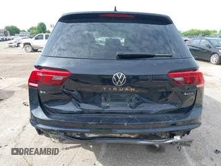2023 Volkswagen Tiguan SE with VIN 3VVMB7AXXPM003447, listed as a IAAI auction lot 42566061 with 39,185 mi miles and . Bid and sale history available at DreamBid. Image 16.