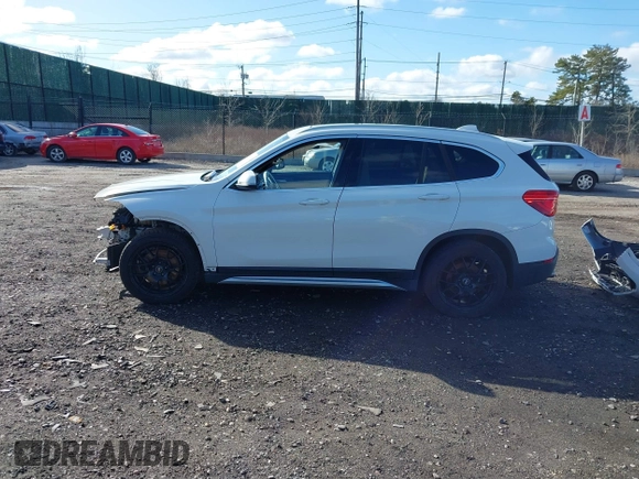 2018 BMW X1 xDrive28i with VIN WBXHT3C34J5L29714, listed as a IAAI auction lot 41825126 with 89,970 mi miles. Bid and sale history available at carsss.com. Image 14.