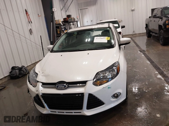 2014 Ford Focus Titanium with VIN 1FADP3N27EL110287, listed as a IAAI auction lot 42210697 with 107,741 mi miles and . Bid and sale history available at DreamBid. Image 12.