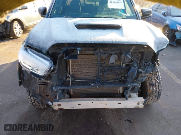 2016 Toyota Tacoma SR with VIN 3TMCZ5AN0GM023263, listed as a IAAI auction lot 41302069 with 137,276 mi miles and . Bid and sale history available at DreamBid. Image 13.