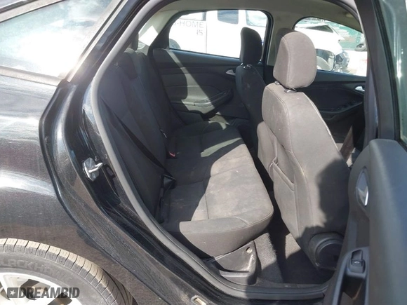 2015 Ford Focus SE with VIN 1FADP3F20FL296173, listed as a IAAI auction lot 41899632 with 136,572 mi miles. Bid and sale history available at carsss.com. Image 8.
